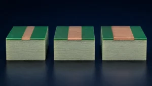 PCB cross-sections comparing standard and heavier copper conductors on fiberglass laminate
